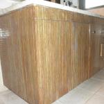 bathroom cabinet painted to look like zebra wood